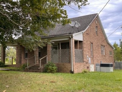 If you're looking for a beautiful remotes setting with on a - Lake Home For Sale in Belton, Kentucky
