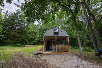 Beautiful 30 +/- acre property just minutes from Lake Ozark! The - photo 1