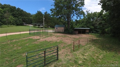 Beautiful 30 +/- acre property just minutes from Lake Ozark! The - photo 2