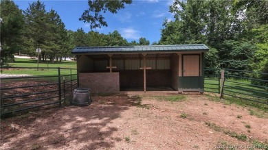 Beautiful 30 +/- acre property just minutes from Lake Ozark! The - photo 3
