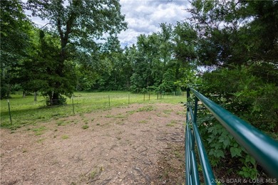 Beautiful 30 +/- acre property just minutes from Lake Ozark! The - photo 8