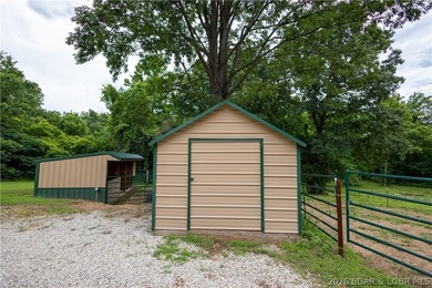 Beautiful 30 +/- acre property just minutes from Lake Ozark! The - photo 9