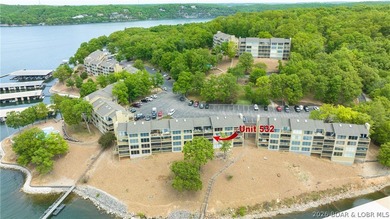 Experience lake living with this fully turn-key 2-bedroom - photo 1