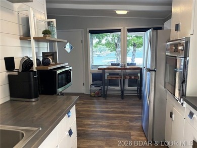 Sitting on a gentle lot in a beautiful cove location, this gem - photo 5
