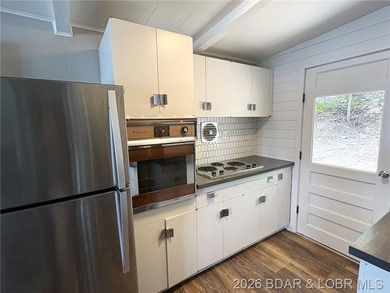 Sitting on a gentle lot in a beautiful cove location, this gem - photo 7