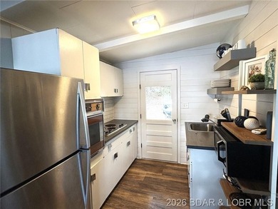 Sitting on a gentle lot in a beautiful cove location, this gem - photo 9
