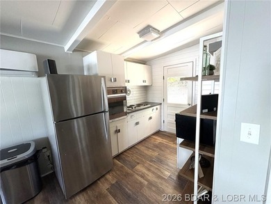 Sitting on a gentle lot in a beautiful cove location, this gem - photo 10