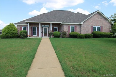 This stunning 3-bedroom, 3.5-bath brick beauty offers over 3,400 - photo 1