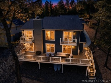 Lakefront home in highly sought-after 6 Mile Cove, Turnkey with - photo 1