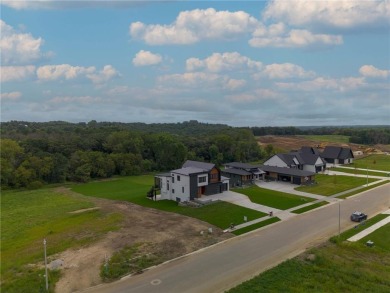 Nestled on a picturesque 1.31-acre lot in northeast Rochester