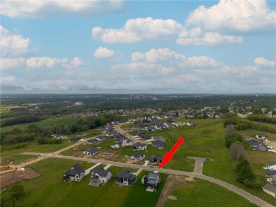 Nestled on a picturesque 1.31-acre lot in northeast Rochester