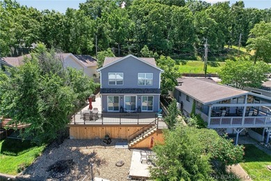 Ready to enjoy lake life from day one? This Beautifully updated - photo 1