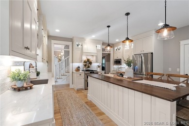 Opportunity at Osage National, this sprawling estate sits on two - photo 8