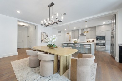 Experience elevated living in this stunning first floor, corner - photo 1