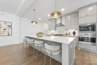 Experience elevated living in this stunning first floor, corner - photo 8