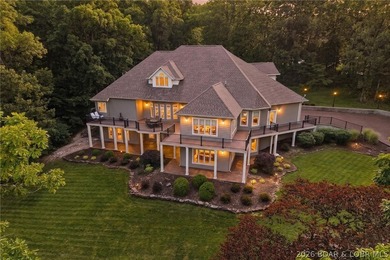 Nestled on a beautifully landscaped 1.3+ acre lot in the - photo 1