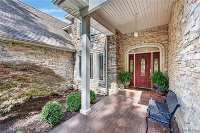 Nestled on a beautifully landscaped 1.3+ acre lot in the - photo 5