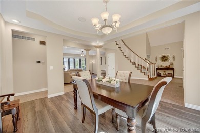 Nestled on a beautifully landscaped 1.3+ acre lot in the - photo 7