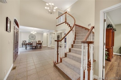 Nestled on a beautifully landscaped 1.3+ acre lot in the - photo 9