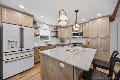 Absolutely charming lake home completely remodeled with great - photo 2