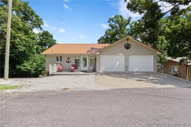 The ultimate Lake of the Ozarks retreat awaits at this premier - photo 3