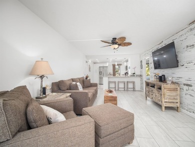 Beautiful and fully remodeled end unit that sits south of the - photo 13