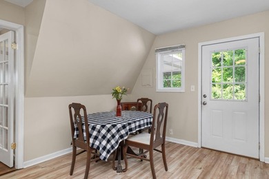 Perched atop a scenic hill with breathtaking water views, this - photo 14