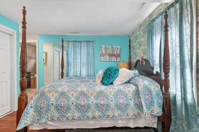 Perched atop a scenic hill with breathtaking water views, this - photo 17