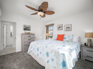 Beautiful and fully remodeled end unit that sits south of the - photo 18