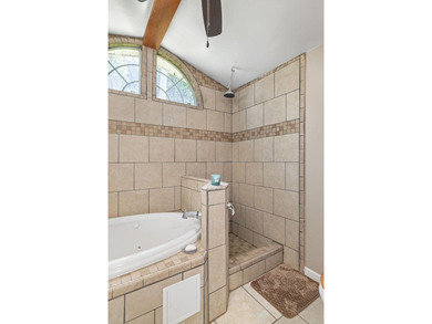 Perched atop a scenic hill with breathtaking water views, this - photo 20