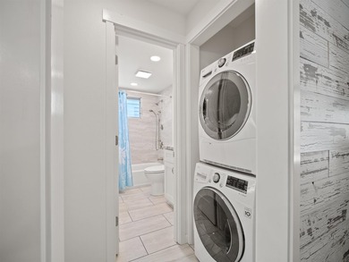 Beautiful and fully remodeled end unit that sits south of the - photo 21
