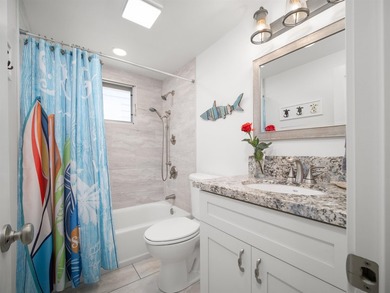 Beautiful and fully remodeled end unit that sits south of the - photo 22