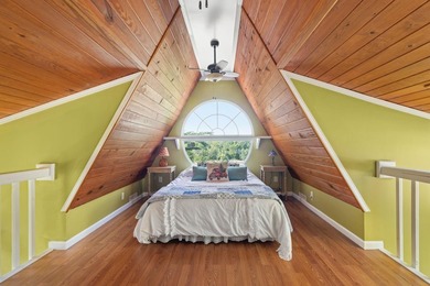 Perched atop a scenic hill with breathtaking water views, this - photo 23