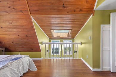 Perched atop a scenic hill with breathtaking water views, this - photo 24
