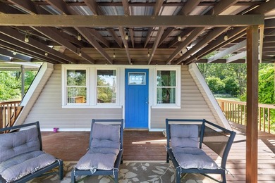Perched atop a scenic hill with breathtaking water views, this - photo 32