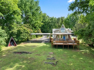 Perched atop a scenic hill with breathtaking water views, this - photo 33