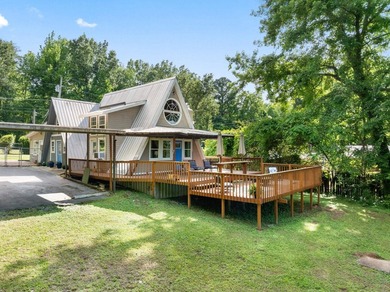 Perched atop a scenic hill with breathtaking water views, this - photo 34