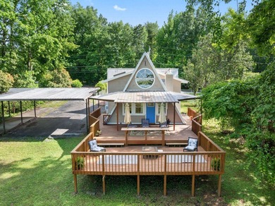 Perched atop a scenic hill with breathtaking water views, this - photo 36