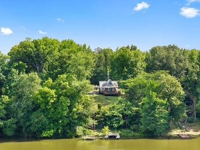 Perched atop a scenic hill with breathtaking water views, this - photo 38