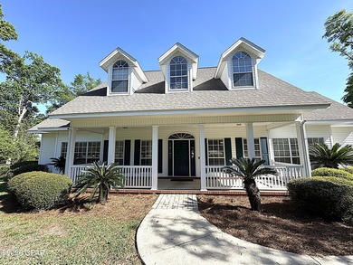 Located on the Magnolia Oaks Golf Course 12th hole and fairway - photo 2