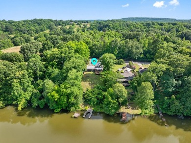 Perched atop a scenic hill with breathtaking water views, this - photo 42
