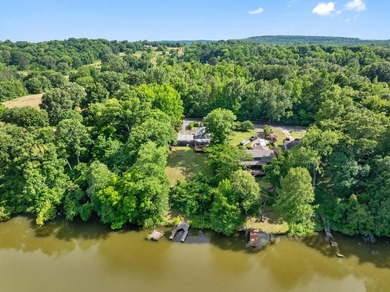 Perched atop a scenic hill with breathtaking water views, this - photo 43
