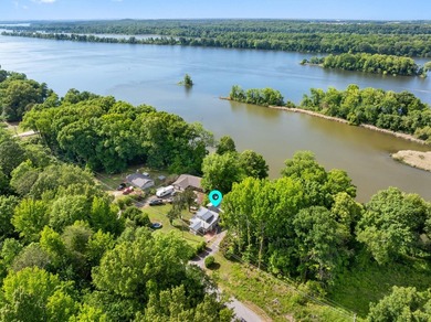 Perched atop a scenic hill with breathtaking water views, this - photo 44