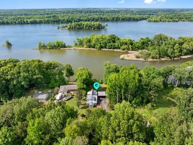 Perched atop a scenic hill with breathtaking water views, this - photo 46