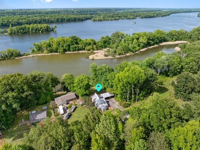 Perched atop a scenic hill with breathtaking water views, this - photo 48