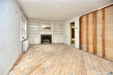 Nestled on approximately 1.1 acres in Southport, this classic - photo 4