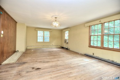 Nestled on approximately 1.1 acres in Southport, this classic - photo 7