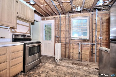 Nestled on approximately 1.1 acres in Southport, this classic - photo 10