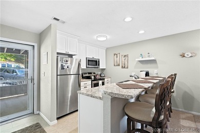 Welcome to lakefront living at its finest in the highly - photo 2
