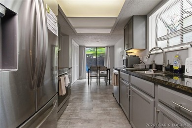 Experience the best of Lake living in this beautifully remodeled - photo 9